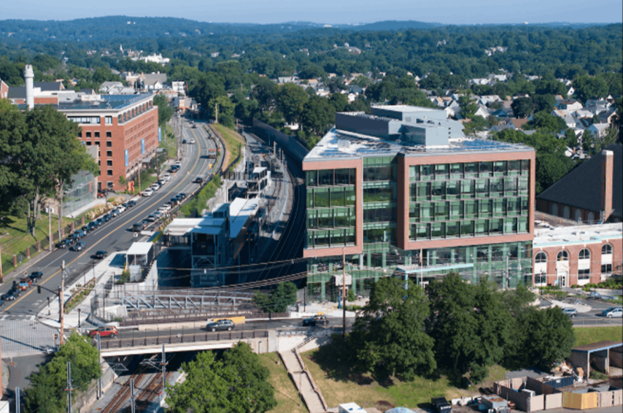 Exterior of the Joyce Cummings Center and the surrounding campus.